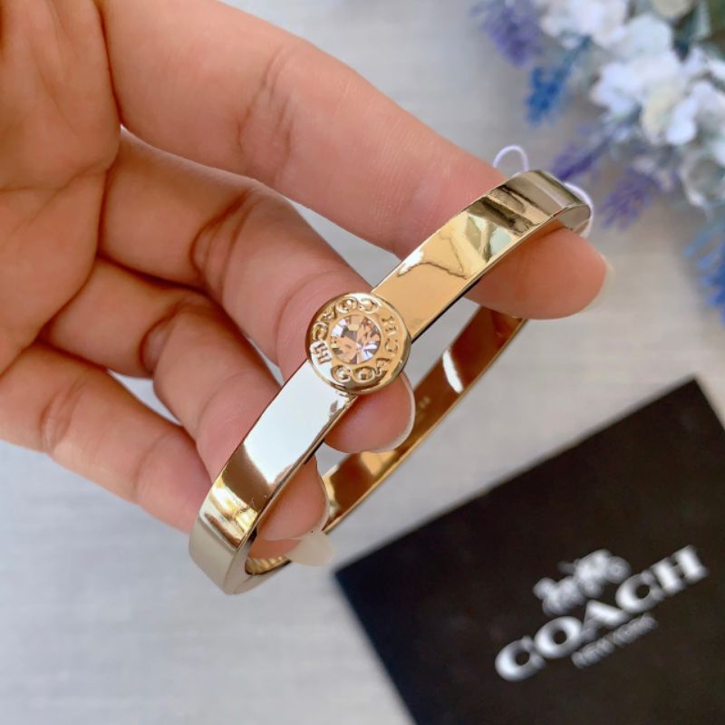 ส่งฟรี-กำไล-สีทอง-coach-c0199-open-circle-hinged-bangle-รอบวง-17-17-5เซนติเมตร