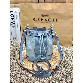 COACH MINI DEMPSEY BUCKET BAG IN SIGNATURE JACQUARD WITH STRIPE AND COACH PATCH