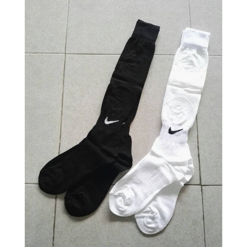 ภาพหน้าปกสินค้าถุงเท้าบอลเด็ก ลาย Nike ถุงเท้าข้อยาว ถงเท้าฟุตบอลเด็กใส่รองเท้าเบอร์37-40