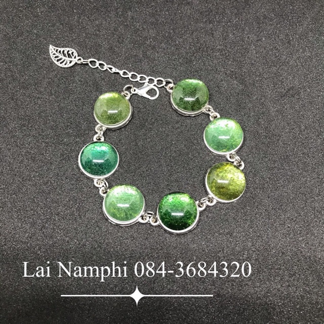 ภาพหน้าปกสินค้าข้อมือไหลน้ำพี้ (Lai Namphi) สีเขียวเข้ม+เขียวมรกต