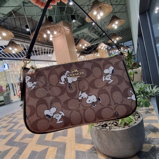 COACH TOP HANDLE POUCH IN SIGNATURE WITH SNOOPY PRINT
