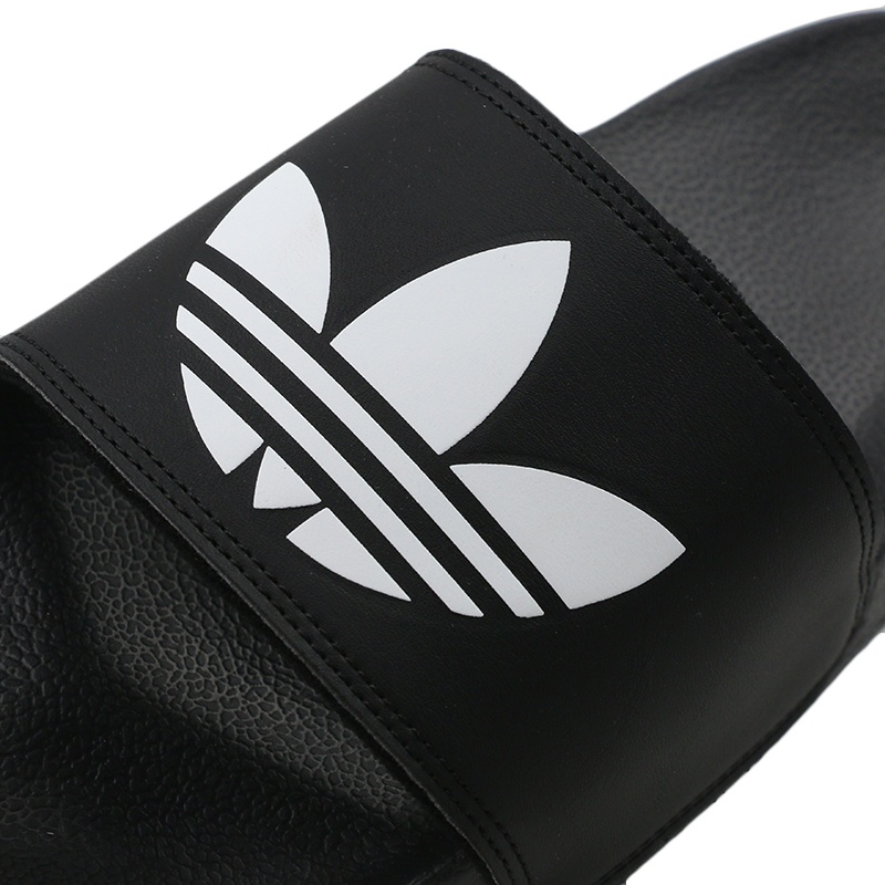 รองเท้าแตะชาย-พื้นนิ่ม-adidas-adilette-comfort-ลาย-adidas