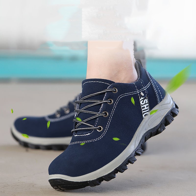 ภาพหน้าปกสินค้าสินค้าพร้อมส่ง รองเท้าหัวเหล็ก ป้องกันการชนและป้องกันการแทง ระบายอากาศและสวมใส่ได้ถูก รองเท้าผู้ชาย blue