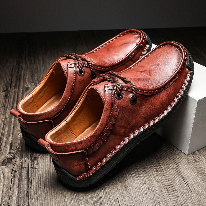 ภาพหน้าปกสินค้าแฟชั่นผู้ชายเท้ากว้างธุรกิจรองเท้าหนังเกาหลีสไตล์เยาวชนนุ่มด้านล่างไขมันเท้าสี่ฤดูกาลรองเท้าลำลอง men leather shoes