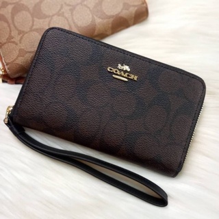 NEW IN COACH PHONE WALLET IN SIGNATURE COATED CANVAS