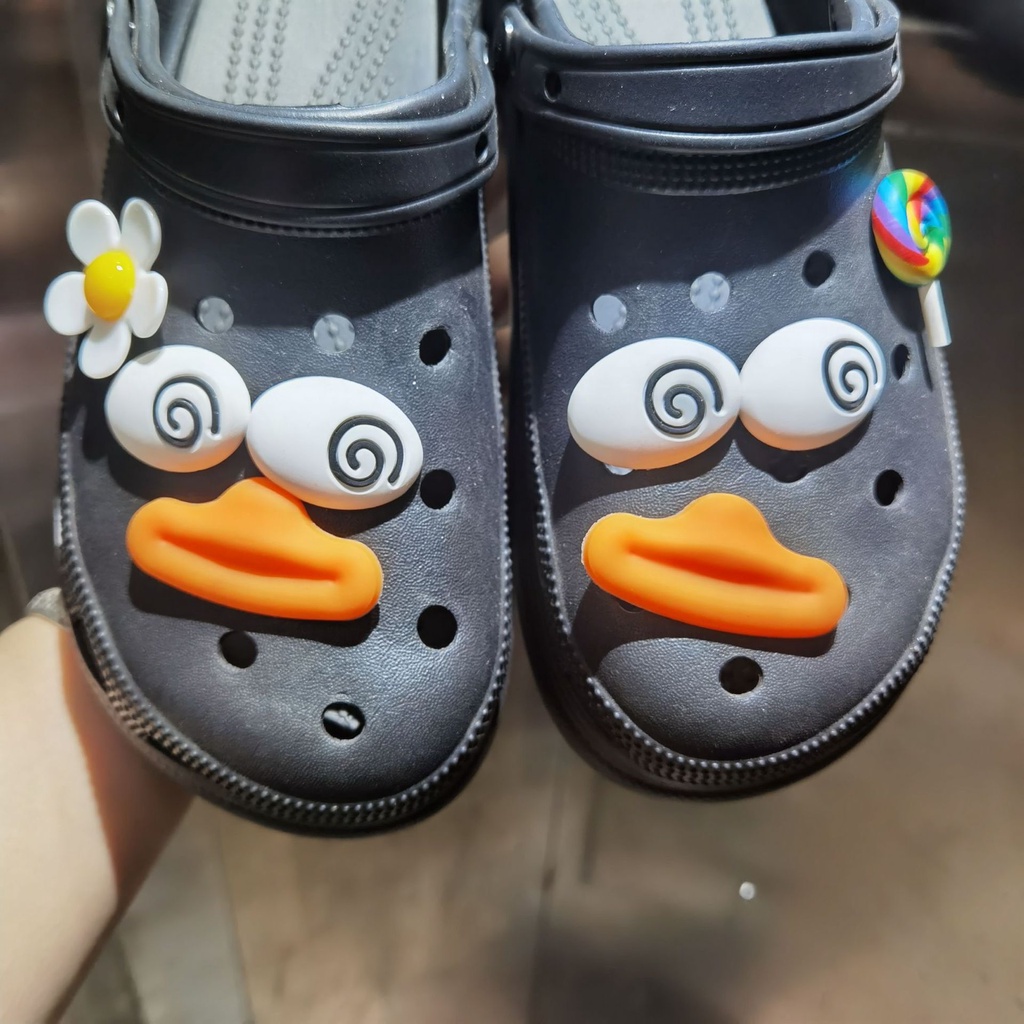 การ์ตูนเป็ดอมยิ้ม-crocs-ชุดเสน่ห์ดอกทานตะวัน-croc-jibbits-โซ่ดอกทานตะวันรองเท้า-charms-pins-heart-eye-jibitz-สําหรับเด็กรองเท้าอุปกรณ์เสริมตกแต่ง
