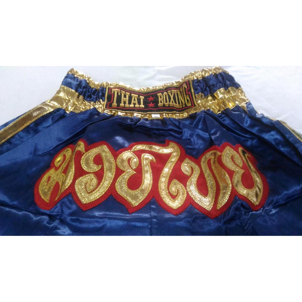 ภาพหน้าปกสินค้ากางเกงมวยไทย สีน้ำเงิน ตัวอักษรสีทอง - S -Kombat Gear Muay Thai Boxing shorts Blue - Gold Letter Pattern