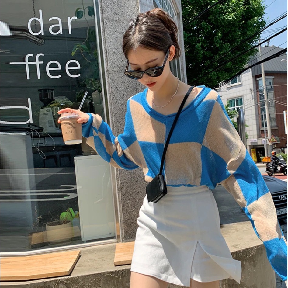 ภาพหน้าปกสินค้าXiaozhainvเสื้อสเวตเตอร์กันแดดแขนยาวลายตารางสีเวอร์ชั่นเกาหลี จากร้าน xiaozhainv.th บน Shopee