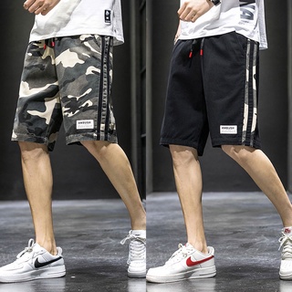 กางเกงขาสั้นลําลองแฟชั่นสําหรับผู้ชายผ้าฝ้าย 100% ทรงหลวมเหมาะกับการวิ่งจ็อกกิ้งเล่นกีฬา
