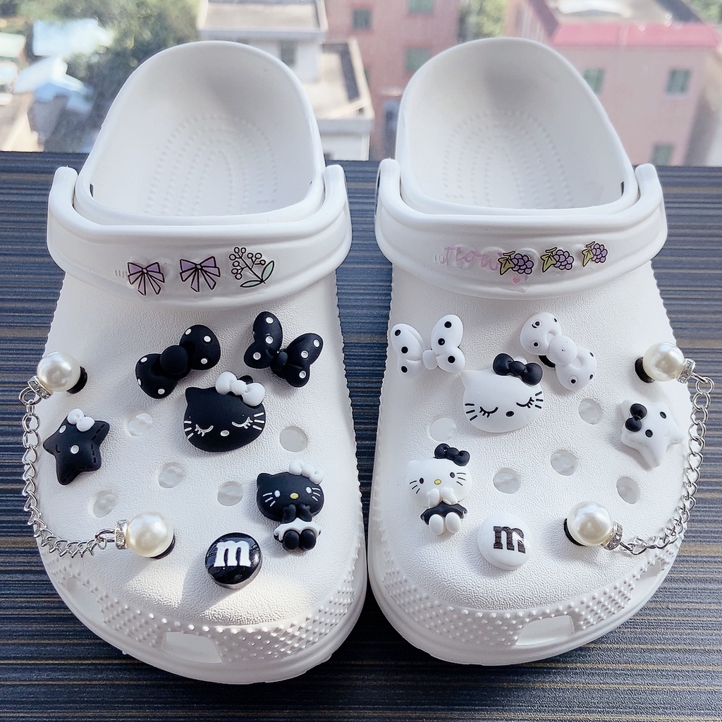 ภาพหน้าปกสินค้า14 ชิ้น Hello Kitty croc jibz Charm ปุ่มรองเท้า Charm-croc /jibz /ปุ่ม croc /Charm /DIY