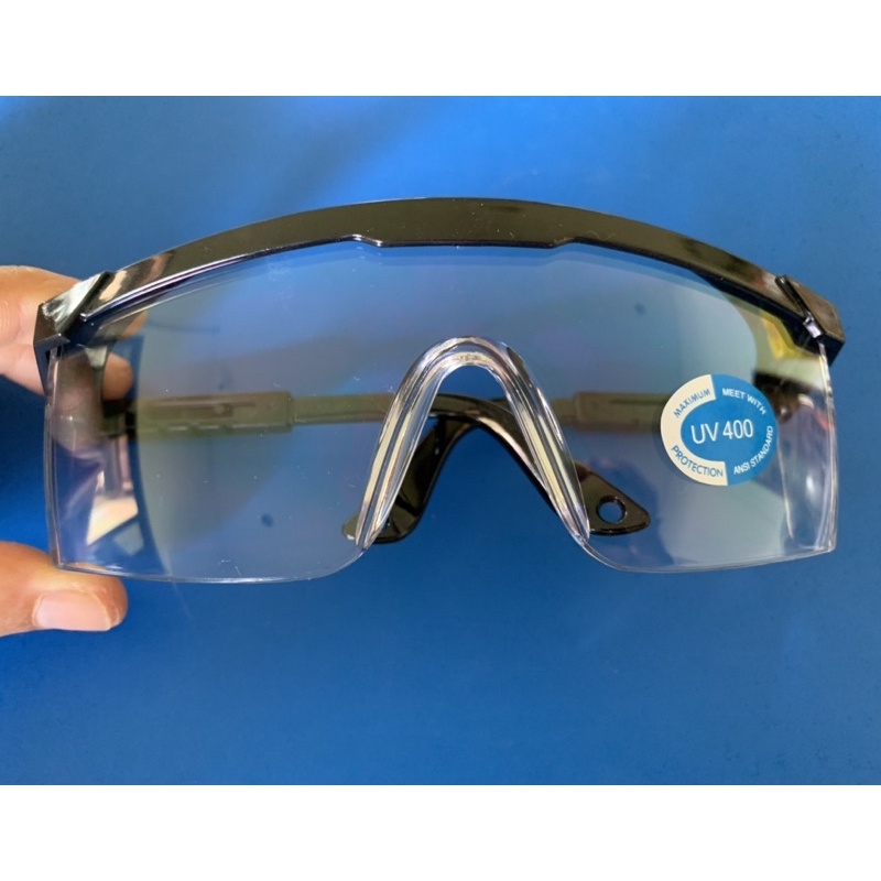 ภาพหน้าปกสินค้าแว่นตาตัดหญ้า แว่นตานิรภัย ป้องกัน UV 400 ป้องกันสะเก็ดและแสง