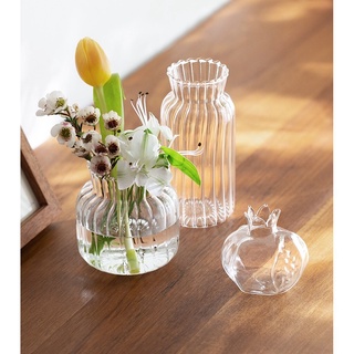 ภาพหน้าปกสินค้าMini vase แจกันแก้ว ลายคลื่น ขนาดสำหรับวางบนโต๊ะ ที่เกี่ยวข้อง