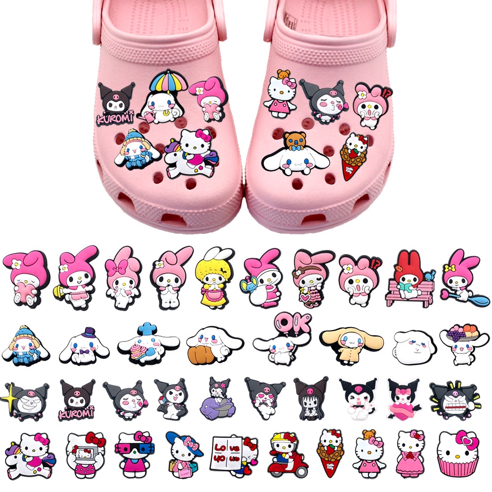 ภาพหน้าปกสินค้าSanrio ตัวติดรองเท้า ลายการ์ตูน Melody Yugui dog Kulomi Hello kitty Crocs Pin Jibbitz น่ารัก ถอดได้ 1 ชิ้น อุปกรณ์เสริม สําหรับตกแต่งรองเท้าแตะ DIY