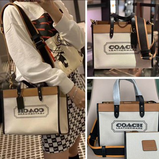 ภาพขนาดย่อของภาพหน้าปกสินค้าแท้ % พร้อมส่งCOACH C0777 กระเป๋าถือกระเป๋าสะพายผ้าใบกระเป๋าสะพายข้างกระเป๋าเป้สะพายหลังลายทางพิมพ์แม่ในกระเป๋าช้อปปิ้ จากร้าน fsadfjkl565 บน Shopee