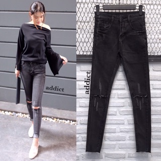 Ripped black denim skinny pants