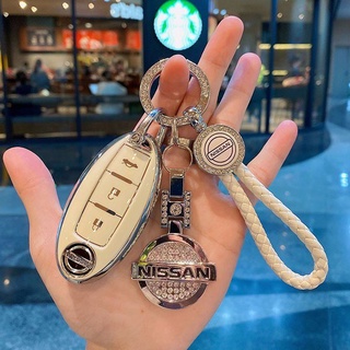 ภาพหน้าปกสินค้า【Ax.safe】ปลอกกุญแจรถยนต์ กันน้ํา สําหรับ Nissan 370z GTR almera patrol royale xtrail terra พวงกุญแจรถยนต์ พวงกุญแจ อุปกรณ์แต่งรถยนต์ พวงกุญแจรถ ซองใส่กุญแจรถ ซองใส่กุญแจรถ ที่เกี่ยวข้อง