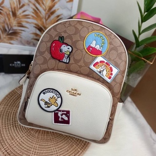 COACH X PEANUTS COURT BACKPACK IN SIGNATURE CANVAS WITH VARSITY PATCHES