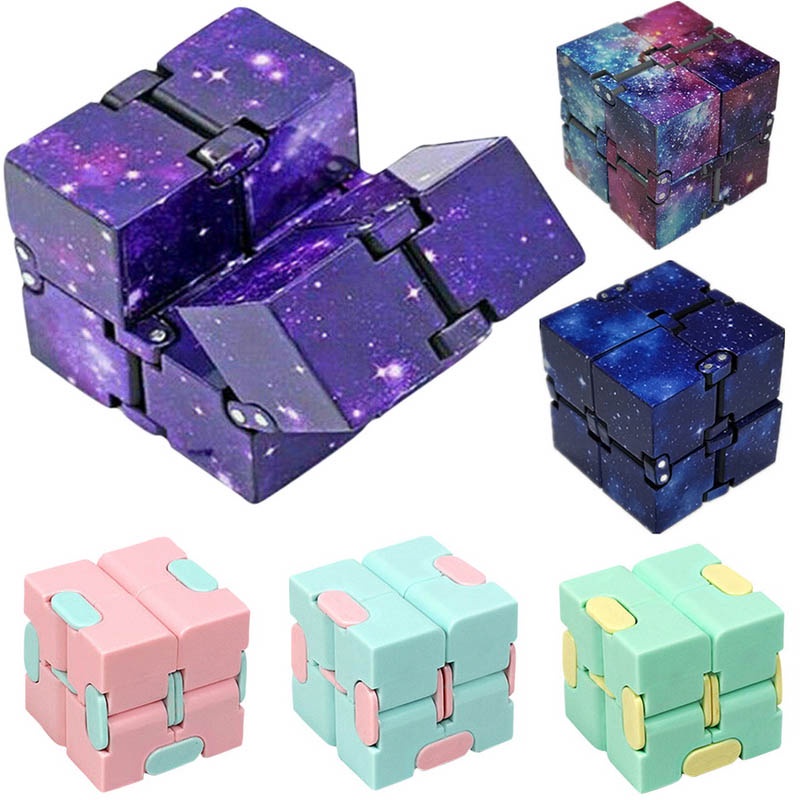 ภาพหน้าปกสินค้าองเล่น ของเล่นเด็ก Fidget Infinity Magic Cube Puzzle สําหรับเล่นคลายเครียด
