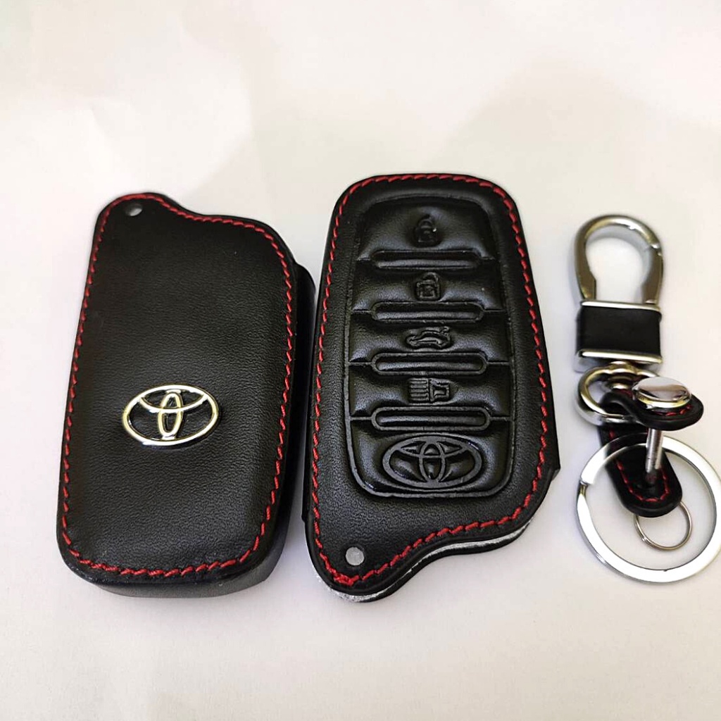 ภาพหน้าปกสินค้าซองหนังใส่รีโมทกุญแจ Toyota Fortuner / Camry รุ่น Smart Key เคสรีโมท เคสกุญแจ