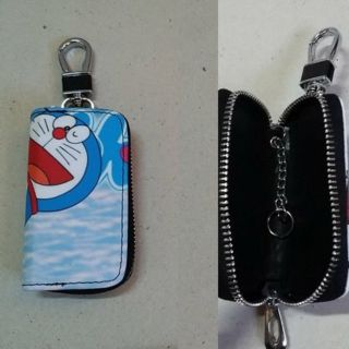 กระเป๋าเก็บกุญแจ รีโมท (หน้าหลังคนละลาย) ลาย โดราเอม่อน Doraemon ขนาด 5x9x2 ซม.