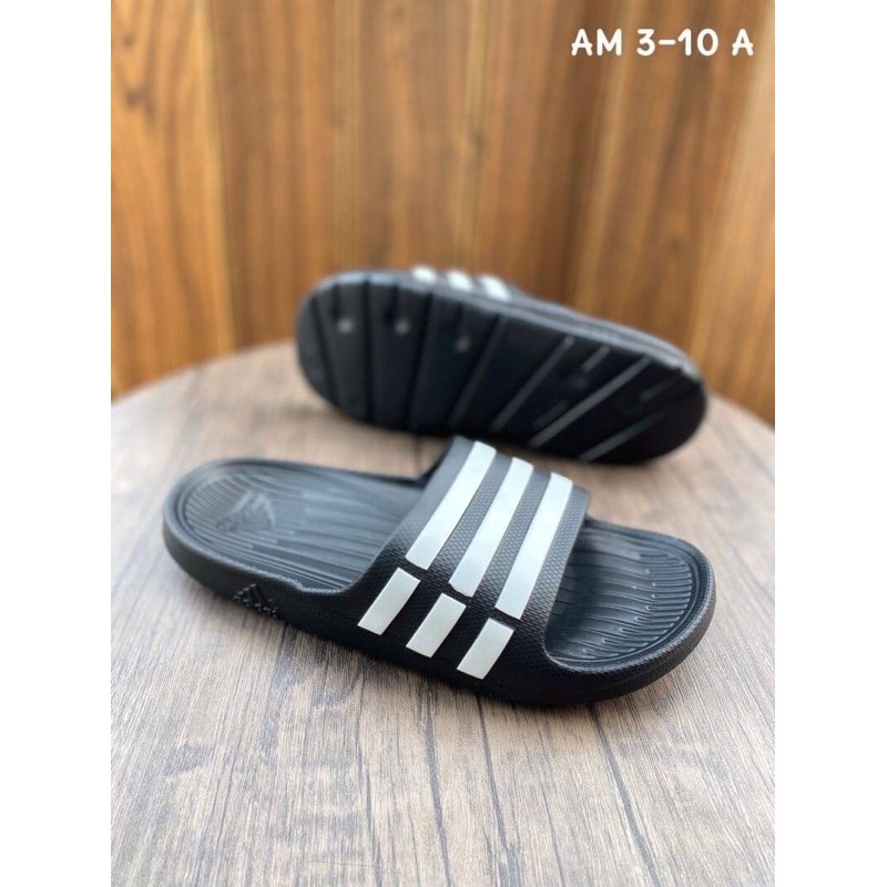 ภาพหน้าปกสินค้ามีเก็บปลายทาง รองเท้าแตะ adidas duramo slide รองเท้าแตะ รองเท้าแตะราคาถูก รองเท้าราคาถูก รองเท้าอดิดาส รองเท้าผ้าใบ จากร้าน boonchuboochoon บน Shopee