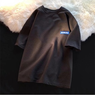 เสื้อยืดคอกลม แขนสั้น พิมพ์ลายวาฟเฟิล ทรงหลวม สีพื้น เข้ากับทุกการแต่งกาย สไตล์เรียบง่าย เหมาะกับฤดูใบไม้ผลิ และฤดูร้อน