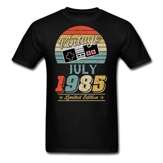 เสื้อยืดผ้าฝ้ายเสื้อยืดแขนสั้น ผ้าฝ้าย พิมพ์ลาย July 1985 Gamer Birthday Gift สไตล์วินเทจ แฟชั่นสําหรับผู้ชาย 2022L XL