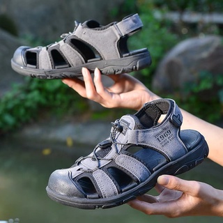 ภาพหน้าปกสินค้าQiaoYiLuo ผู้ชายรองเท้าแตะใหม่สบายๆขนาดใหญ่ทำด้วยมือรองเท้าชายหาดกีฬาลื่น Breathable EVA รองเท้า 3 สี ที่เกี่ยวข้อง