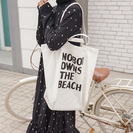 bag-1-bag1783-กระเป๋าผ้าใบใหญ่-nobody-owns-the-beach-ผ้าแคนวาสมี4สาย