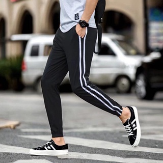 ภาพหน้าปกสินค้าS-2XL กางเกง Men\'s Korean Fashion Casual Long Pants Men Drawstring Sports Jogging Pants ที่เกี่ยวข้อง