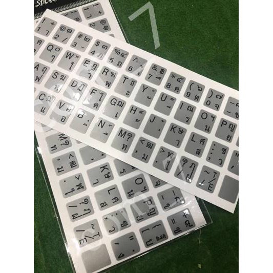ภาพหน้าปกสินค้าสติกเกอร์คีย์บอร์ด พื้นสีเทาตัวหนังสือสีดำ ภาษาไทย อังกฤษ / Thai English Keyboard sticker สติ๊กเกอร์ภาษาไทย