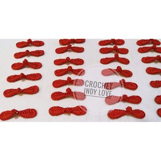 ภาพหน้าปกสินค้ากระดุมจีนถัก กระดุมตะกร้อ ขนาด7ซม. สีแดงสด ที่เกี่ยวข้อง