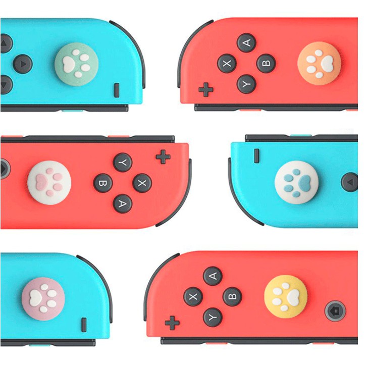 ภาพหน้าปกสินค้ายางหุ้ม Analog สำหรับ Nintendo Switch และ Nintendo Switch Lite สีพาสเทล จากร้าน gamegodshop บน Shopee