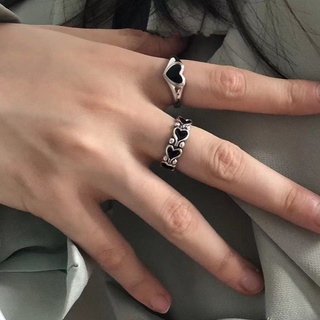ภาพหน้าปกสินค้าแหวนนิ้วมือ รูปหัวใจ สามารถปรับได้ สีดํา เรียบง่าย สไตล์วินเทจ โกธิค ฮิปฮอป ของขวัญ สําหรับผู้ชาย และผู้หญิง เพื่อน ที่เกี่ยวข้อง