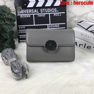 CHARLES &amp; KEITH CIRCULAR BUCKLE CROSSBODY BAG ของแท้ ราคาถูก