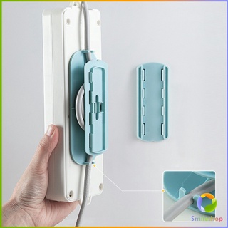 Smileshop ที่เก็บสายปลั๊กไฟ 2 in 1  ที่ยึดรางแบบแขวนผนังไร้รอย ตัวยึดรางปลั๊ก  Socket retainer