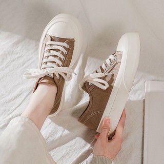 ภาพขนาดย่อของภาพหน้าปกสินค้าลดเพิ่ม40บาท รองเท้าผ้าใบมินิมอล ส้นหนา 3.5 ซม มี 2 สี ขาว น้ำตาล จากร้าน scarpa_official บน Shopee