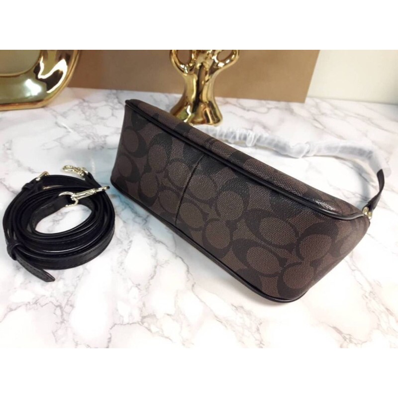 black-in-stock-best-seller-coach-top-handle-pouch-in-signature