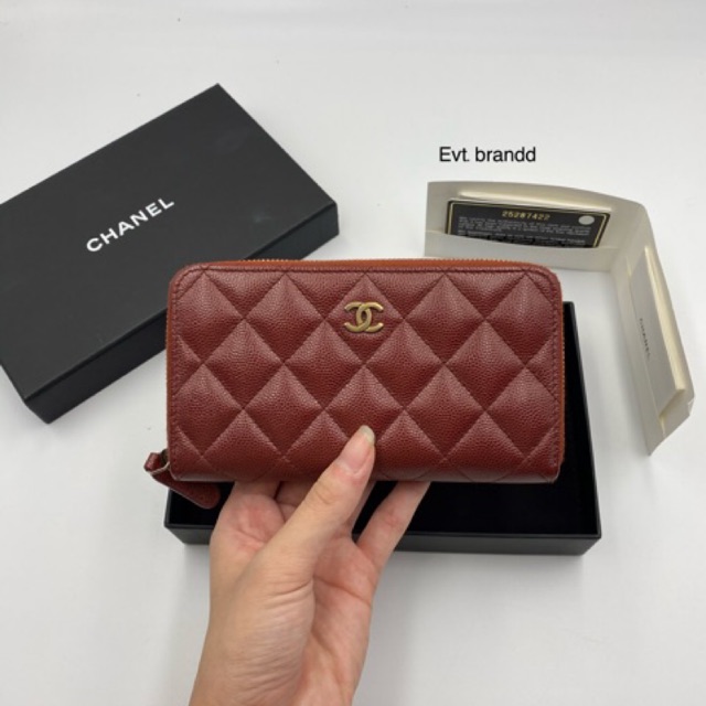 CHANEL Boy Caviar Quilted Zip Around Wallet Yellow