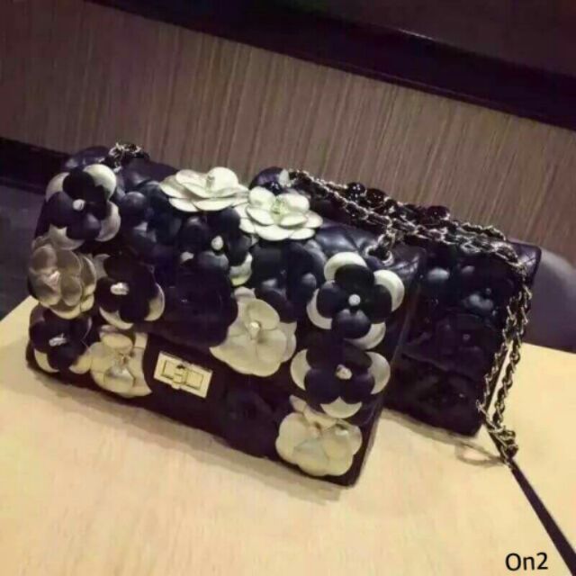 chanel-black-camellia-flap-bag