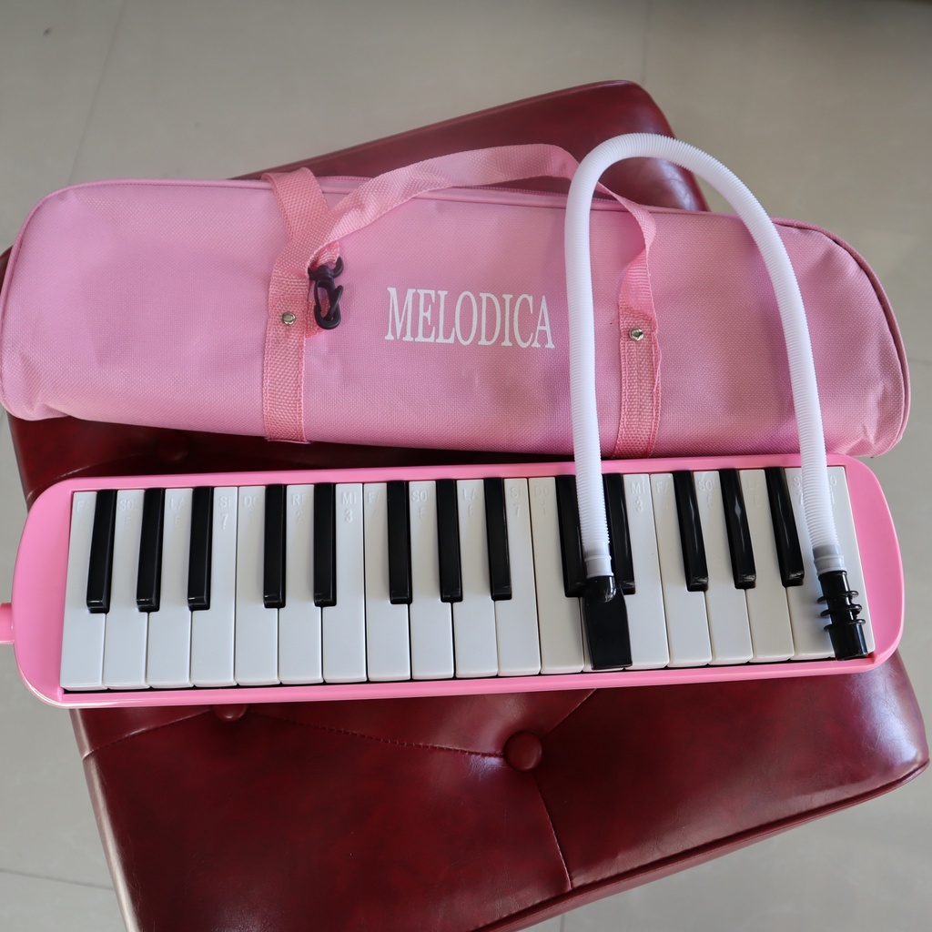 melodica-เมโลเดี้ยน-จำนวน-32-คีย์-สีชมพู-ขนาดมาตรฐาน-เสียงดี-ไม่กินลม-เหมาะสำหรับเด็ก-พร้อม-สายเป่าเมโลเดี้ยน