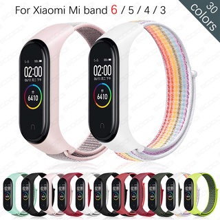 ภาพขนาดย่อของสินค้าสายนาฬิกาข้อมือ ไนลอน สําหรับ Xiaomi mi band 7 6 5 4 3 NFC