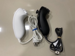 ภาพขนาดย่อของภาพหน้าปกสินค้าNunchuk Nunchuck Wii นันชัค งานแท้ Nintendo สีขาว และดำ จอย จากร้าน japan.gameshop.rareitems บน Shopee