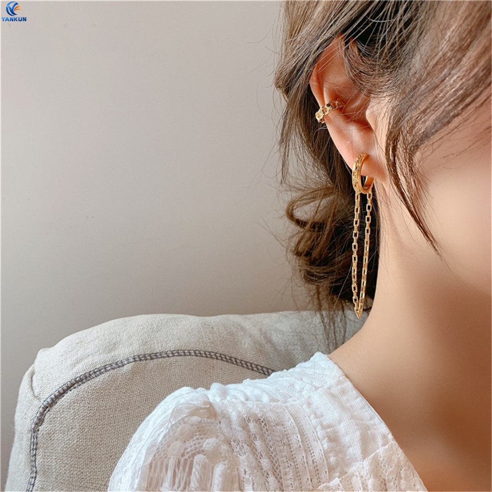 ภาพหน้าปกสินค้าFashion Asymmetrical Temperament Tassel Metal Ring Twined Earrings Simple Ear Bone Clip