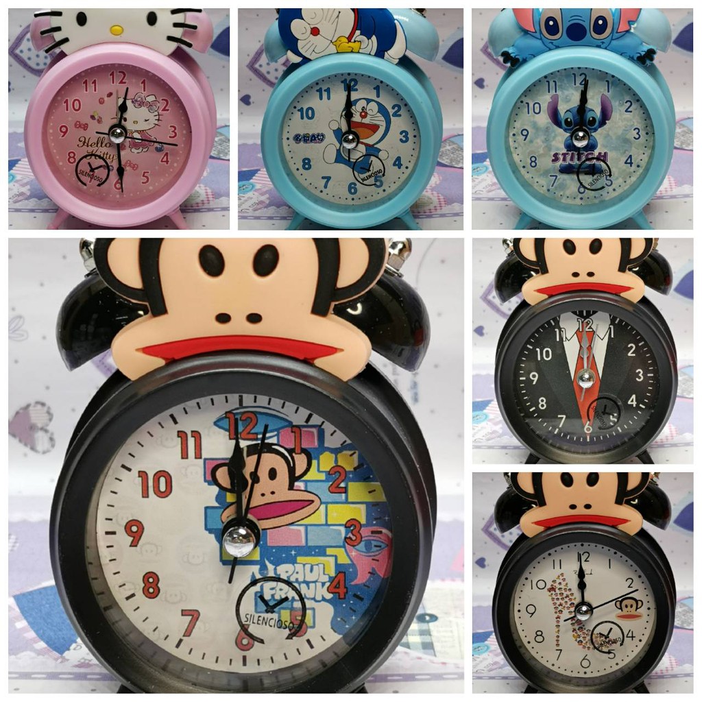 ภาพหน้าปกสินค้านาฬิกาปลุกแบบกระดิ่ง ลายการ์ตูนน่ารักๆ พร้อมไฟหน้าจอ จากร้าน qiurong169 บน Shopee