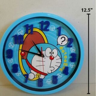 นาฬิกาแขวน สำหรับติดกำแพงห้องค่ะ ตัวเลขบอกเวลาเป็นตัวนูนขึ้นมากค่ะ ลาย โดเรม่อน (Doraemon