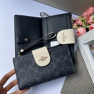 🎀 (สด-ผ่อน) กระเป๋าสตางค์ ใส่โทรศัพท์ ลายซีดินิม COACH C2874 TECH PHONE WALLET IN COLORBLOCK SIGNATURE CANVAS