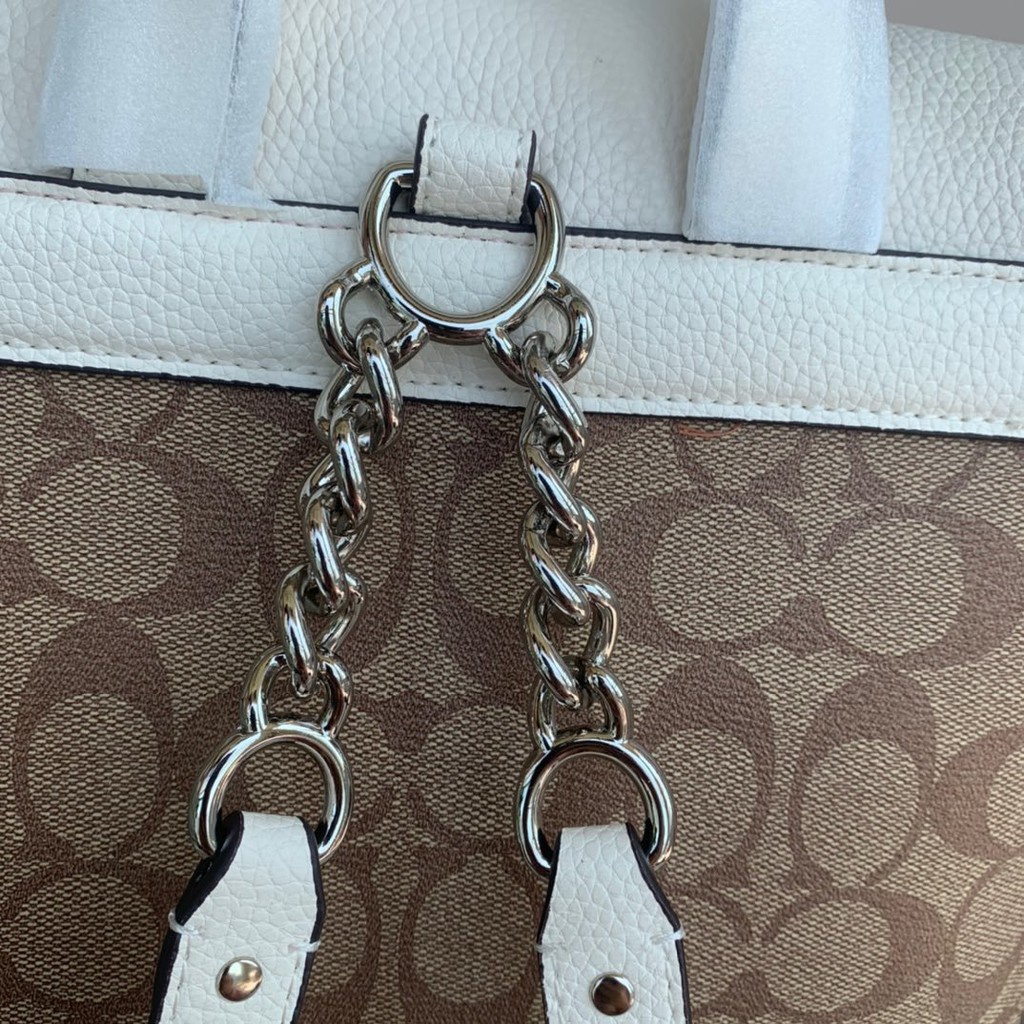 coach-91121-กระเป๋าเป้สะพายหลัง-disney-elle-ในผ้าใบลายเซ็นพร้อมกระเป๋าผู้หญิง-dumbo