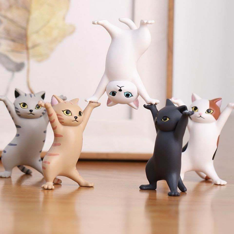 ภาพหน้าปกสินค้าพร้อมส่งจากไทย  ฟิกเกอร์แมวเต้น มี5สี โมเดลแมว ถือของได้ทุกสิ่ง น่ารักที่สุดดด จากร้าน 3qshop บน Shopee