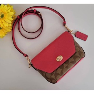 (ผ่อน0%) กระเป๋าสะพายข้าง KARLEE CROSSBODY IN SIGNATURE CANVAS (COACH C2816) IM/KHAKI/FUCHSIA ลายซี สีน้ำตาล ฝาพับสีชมพู